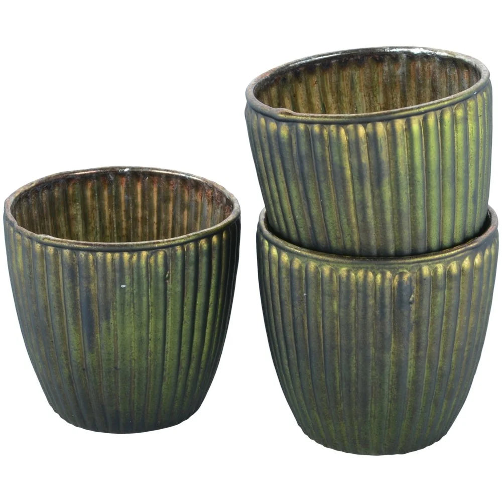 Ribbed dark green tea light holder and tea light
