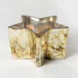 Starry Nights tea light holder with tea light.