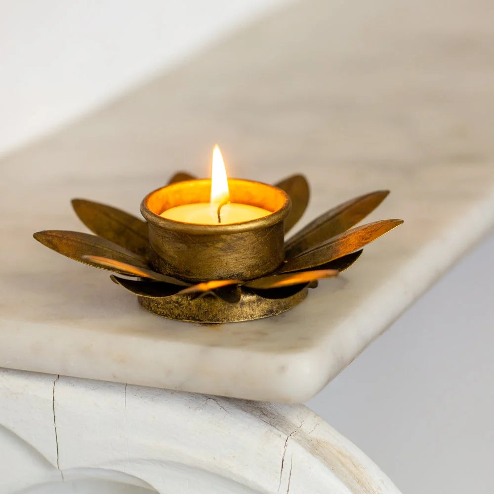 Aztec antique gold tea light holder and tea light.
