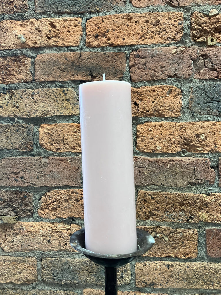 Pastel pink pillar candle